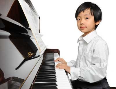 Young Boy Playing Piano